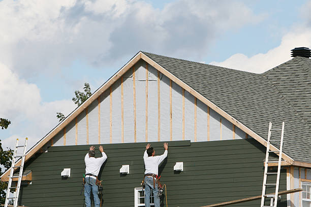 Professional Siding technician working in Madison, VA